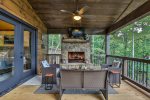 The Main Level Porch With A True Log Burning Fireplace 